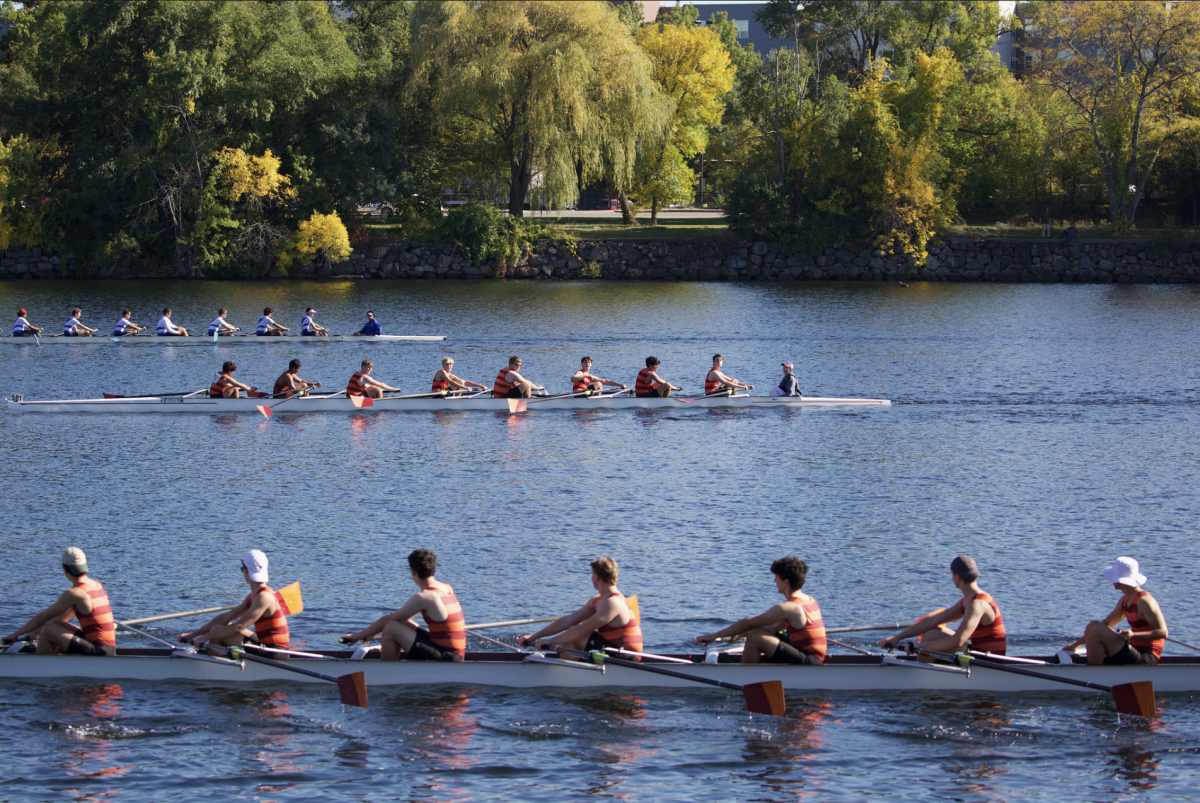 Moments after the varsity boys third eight race, members of the varsity boys third eight row back to dock their boat. While they were rowing back, some of the racers wished members of the varsity boys second eight good luck in their upcoming race.